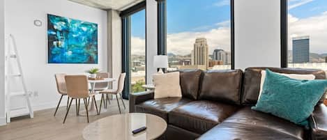 A comfortable sofa is the cornerstone of a cozy living room with Stunning view