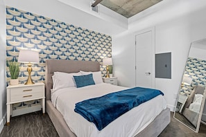 Queen size bed with a new mattress. Relax in style!