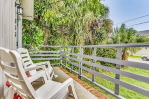 Relax on the front porch in the high-back rocking chairs.