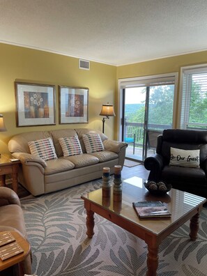 Living Room with balcony entrance.