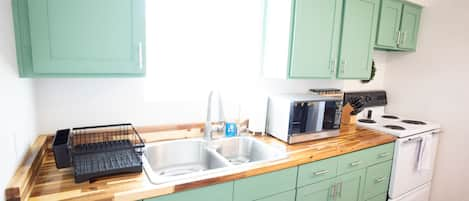 Fully stocked kitchen with water filtration and all the essentials.