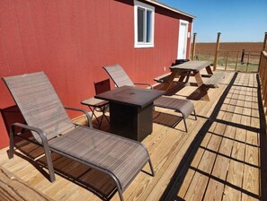 Large deck to lounge and enjoy the breathtaking sunrises & cool evenings