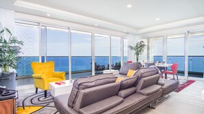 Stunning living room, surrounded by endless vistas.