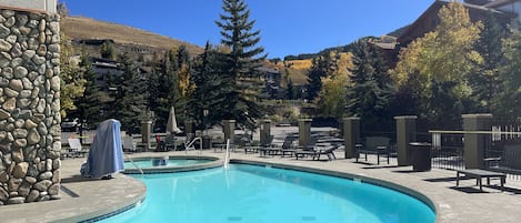 Heated outdoor pool and hot tub with view!