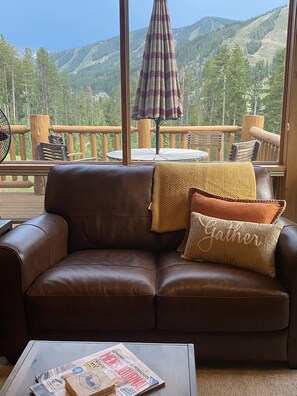 Well appointed living room with 65’ TV with modern sound system for connecting