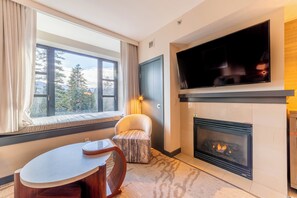 Studio has gas fireplace and TV w/ basic cable and streaming options.