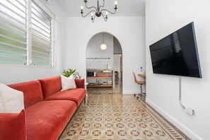 Indulge in relaxation in the living room, complete with a TV