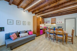 Living room with sofa bed, smart TV, wifi and access to the balcony