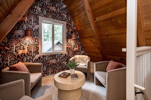 Cozy up in this intimate lounging space while sipping on your favorite beverage.