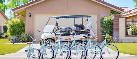 Discover Monterey Country Club's serene pathways and streets using our new beach cruisers and a 6-seater golf cart