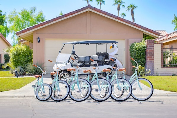 Discover Monterey Country Club's serene pathways and streets using our new beach cruisers and a 6-seater golf cart