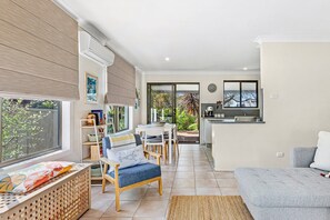 Light filled open plan layout with garden views.