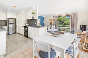 Light filled open plan layout with garden views.