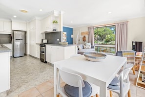 Light filled open plan layout with garden views.