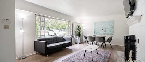 Living and Dining Rooms. (Please note that the fireplace is not operational)