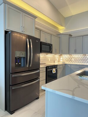 Kitchen Refrigerator with ice maker and filtered water dispenser