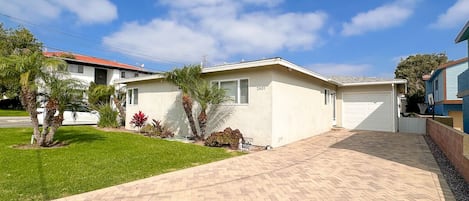 Long driveway for plenty of private parking, plus 1 car garage