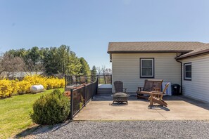 TWO outdoor spaces to relax in the sun or the shade depending on the time of day