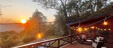 Relax in the hot tub while soaking in the breathtaking porch views.