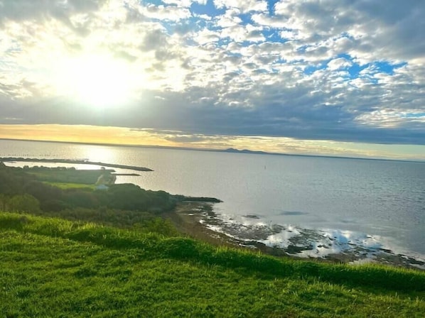 Just a short stroll this is the view and beautiful walk along the public cliff top walkway.
Can see Geelong, Melbourne in the distance