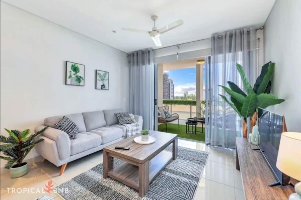 Living room opening out to balcony