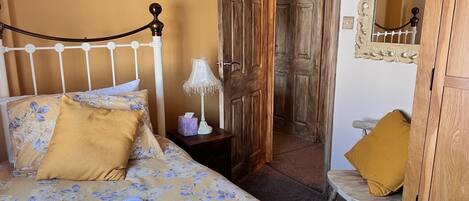 After a day of seaside fun, snuggle into the cosy single bed in our adorable second bedroom - the perfect little nook for sweet dreams.