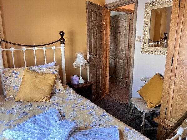 After a day of seaside fun, snuggle into the cosy single bed in our adorable second bedroom - the perfect little nook for sweet dreams.