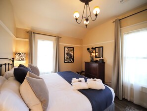 Thoughtful touches in the bedroom for a warm and welcoming stay.