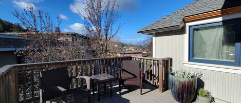 Private deck seating, just outside your front door