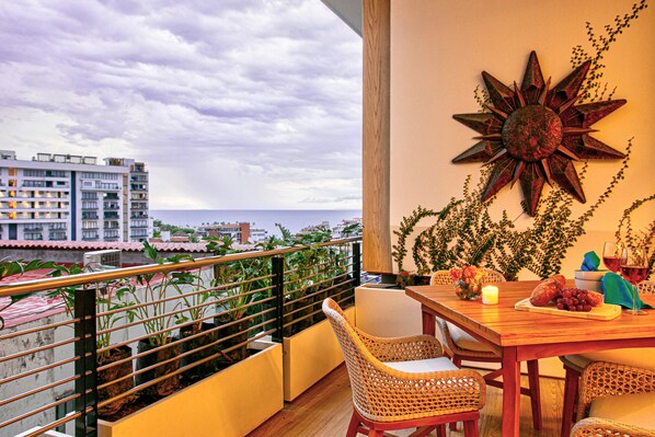 Breathtaking views to the ocean and mountains from the private balcony