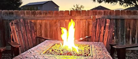 Enjoy the cozy fire pit during an Idaho sunset.