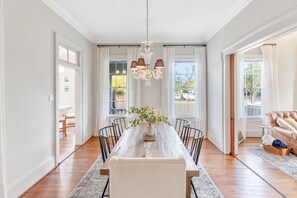 Dining area sits between living room and kitchen. 