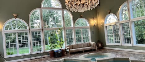 View of indoor pool looking north out windows.