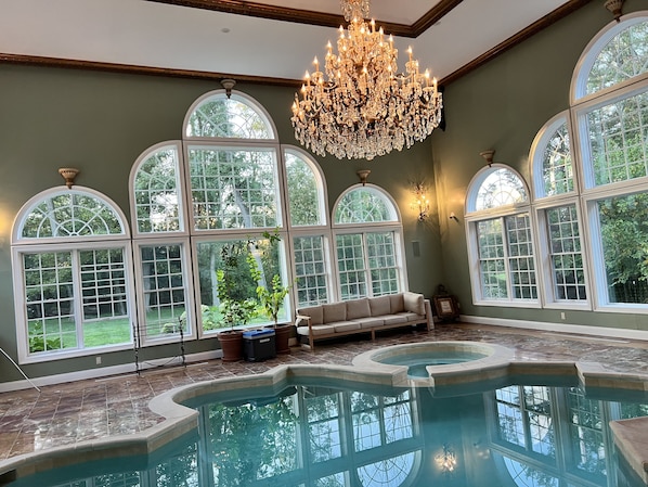 View of indoor pool looking north out windows.