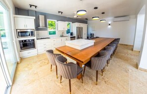 Large fully equipped kitchen with seating for 14 people