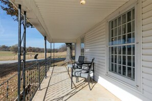 The front porch has the best views! The home faces South.