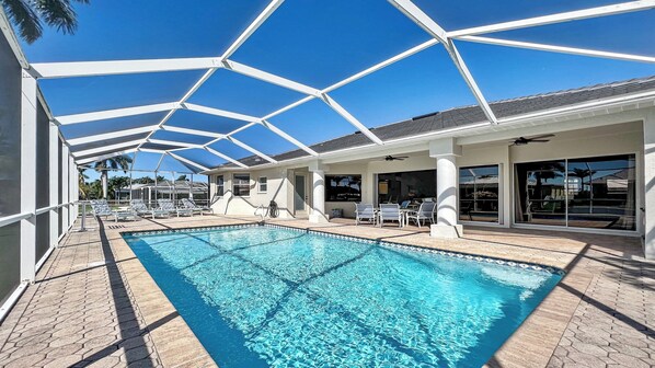 The pool area includes the covered lanai and a sundeck