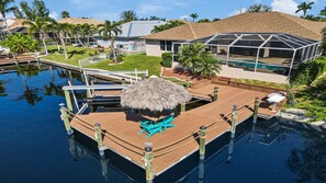 View of the pool area and the outdoor facilities of Villa Lupia