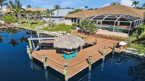 View of the pool area and the outdoor facilities of Villa Lupia