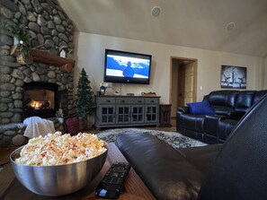 Enjoy your favorite movie with loved ones in front of the fire