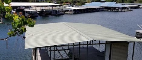 Covered Boat Slip with hoist maximum 25' and 5000lbs and watercraft hoist.