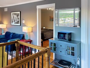 Between the living room and dining area, with a view into Bedroom #2