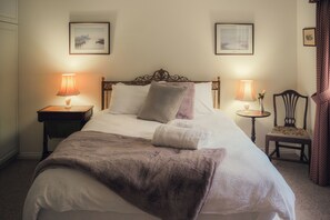 Enjoy a beautiful nights sleep in the lovely English Antique Queen Bedroom