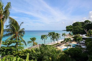 View of the pool deck and beach from your patio