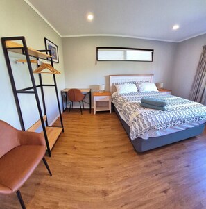 Master bedroom with clothes hangers