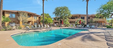 Community Pool (heated) and Spa with plenty of outdoor seating & lounging