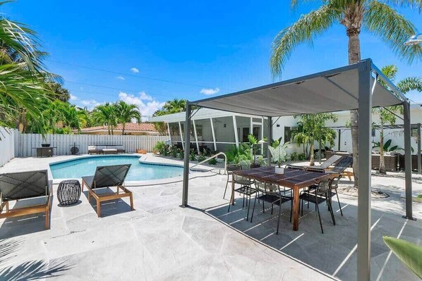 Fully Private Backyard, Tons of seating and lounging outside by the heated pool.