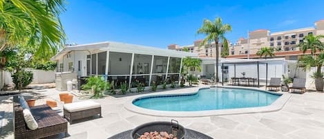 Huge back patio and pool shared with 2 other units on the property.