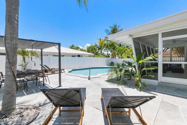 Huge back patio and pool shared with 2 other units on the property.