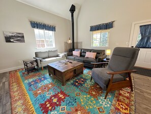 This beautifully decorated living room offers loads of space for relaxing with family and friends.